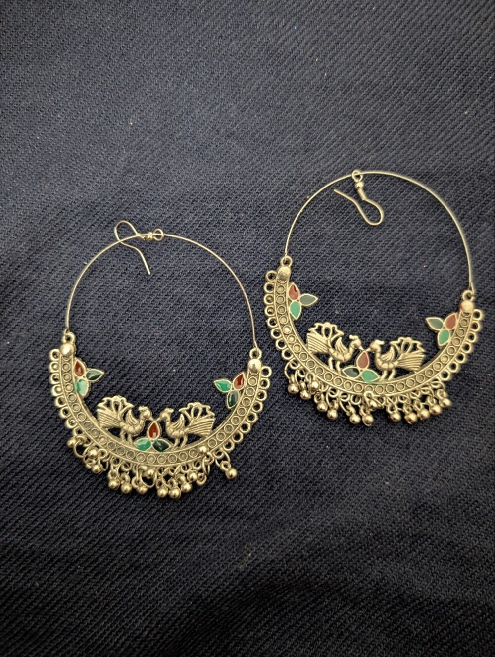 Large Indian Chandbali style crescent moon earrings with peacock motif. Oxidized